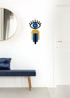 Blue velvet bench with pillow in white and bright corridor